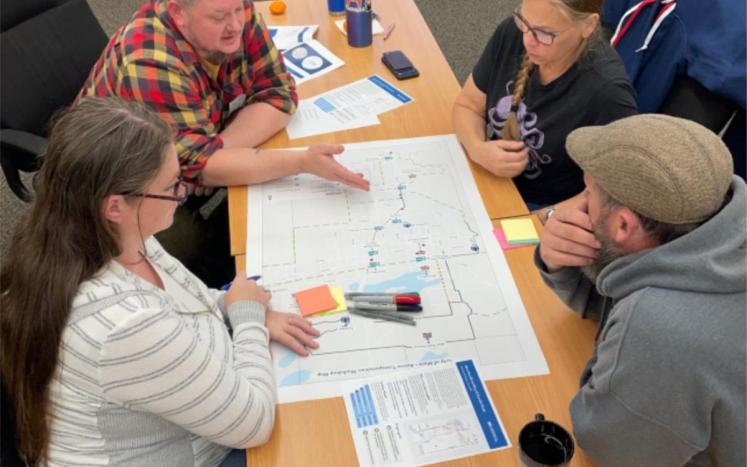 Stakeholders discuss priority corridors to improve walking, biking and rolling through Mora. 